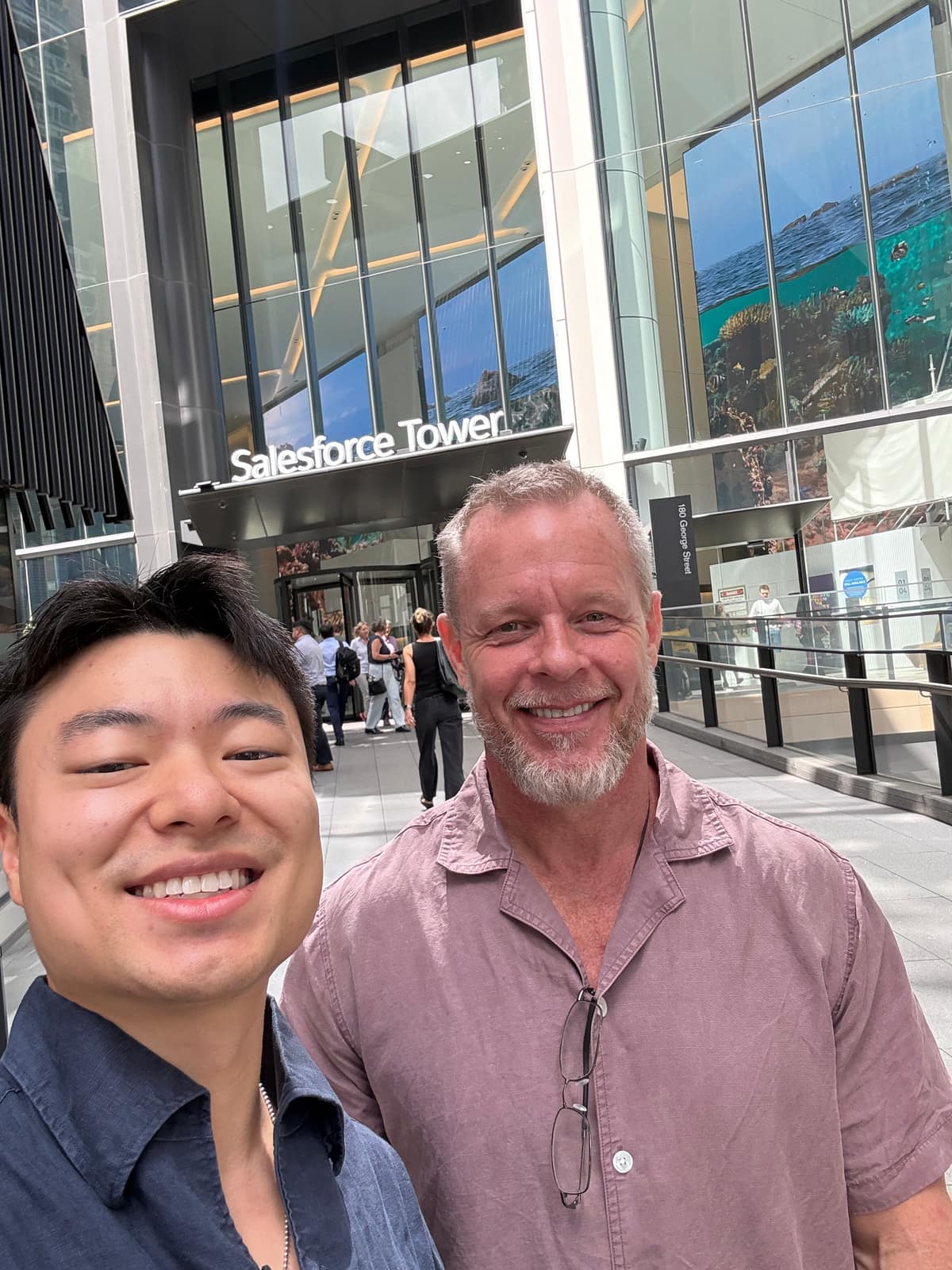Eugene with a partner at Salesforce Tower, Sydney